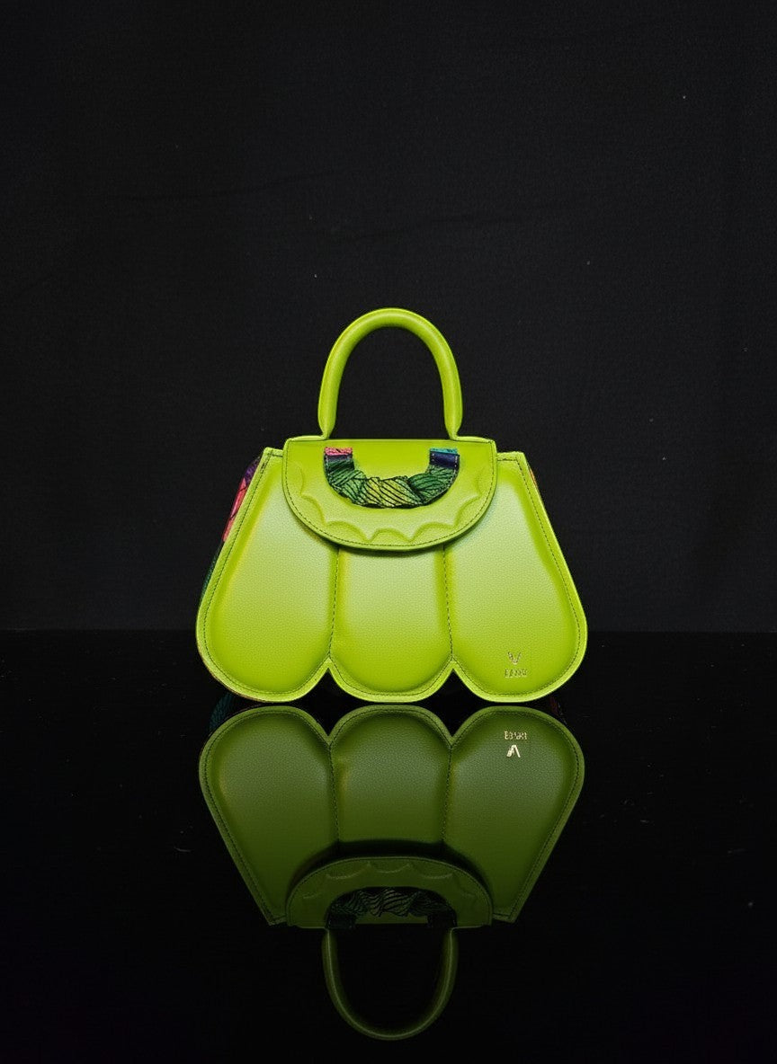 ELVI CREATION Cupidon lime green vegan leather handbag with sculpted petals and colourful woven detail on flap.