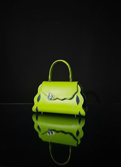 ELVI CREATION Le Trésor lime green vegan leather handbag with wavy edges and gold hardware.