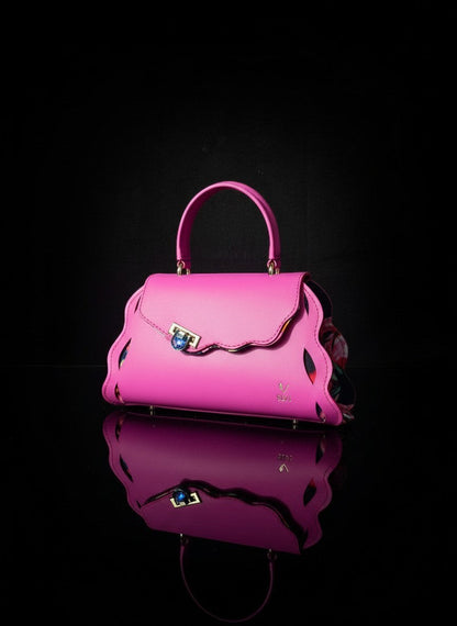 ELVI CREATION Le Trésor pink vegan leather handbag with wavy edges and gold hardware, floral lining.