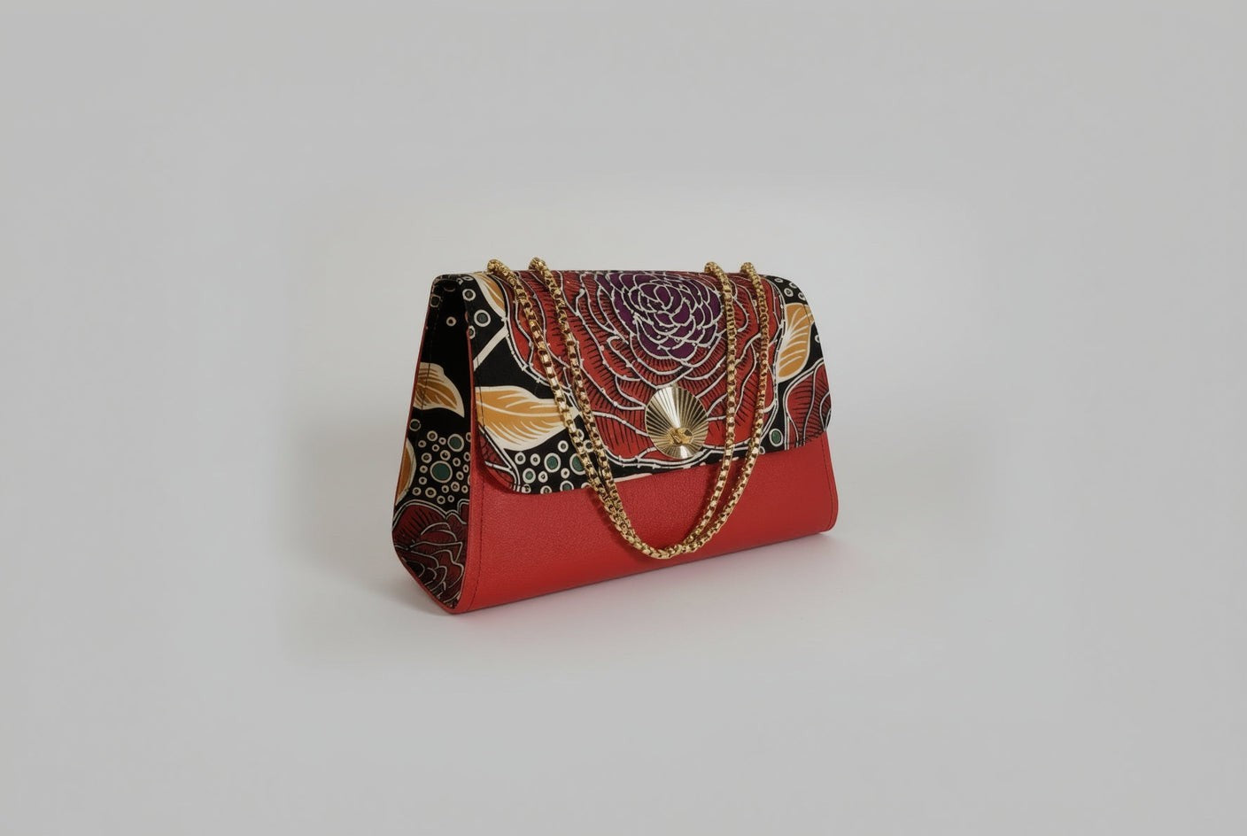 ELVI CREATION Rosa red vegan leather handbag with a large floral wax print flap and gold chain strap.